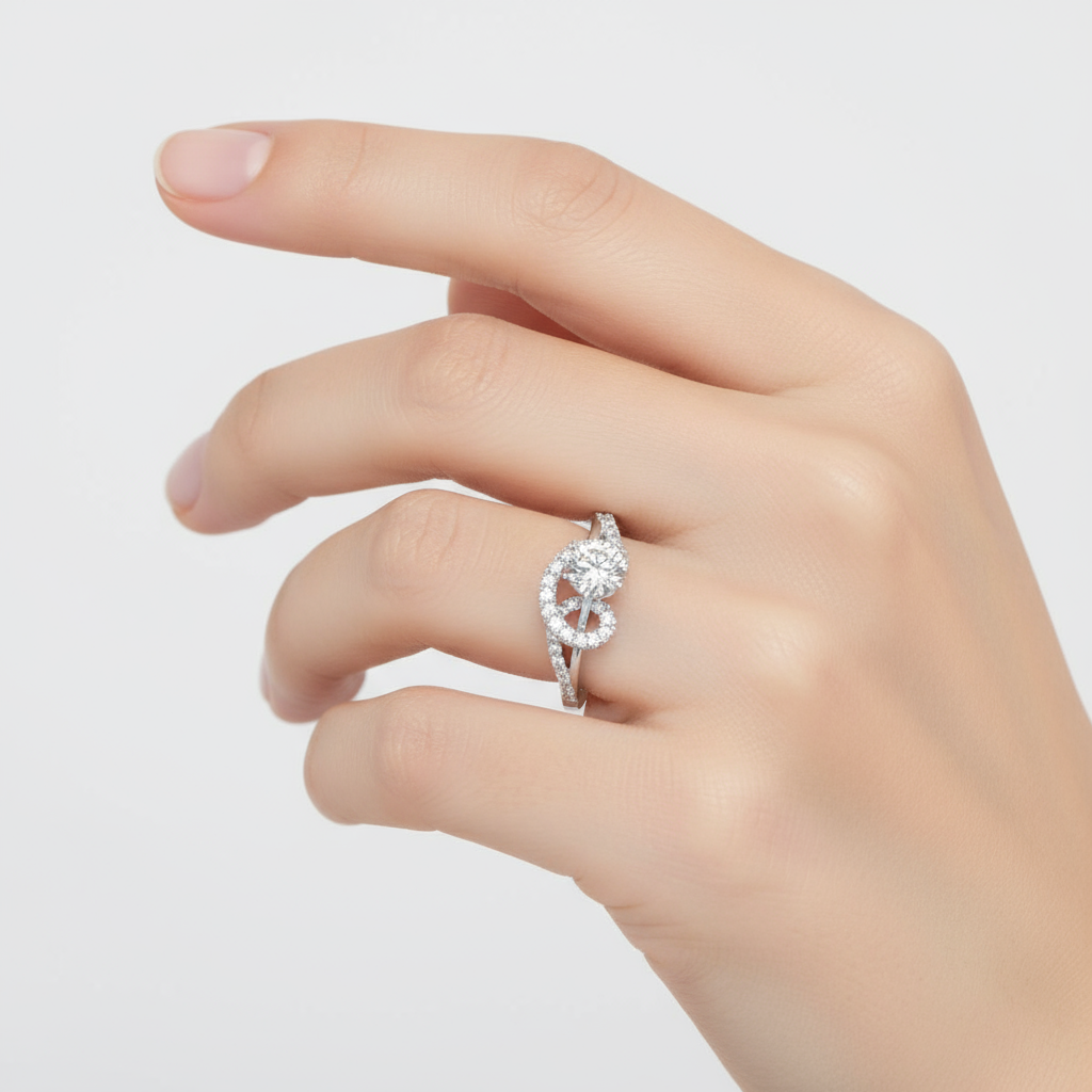 Female model wearing diamond engagement ring with swirl design