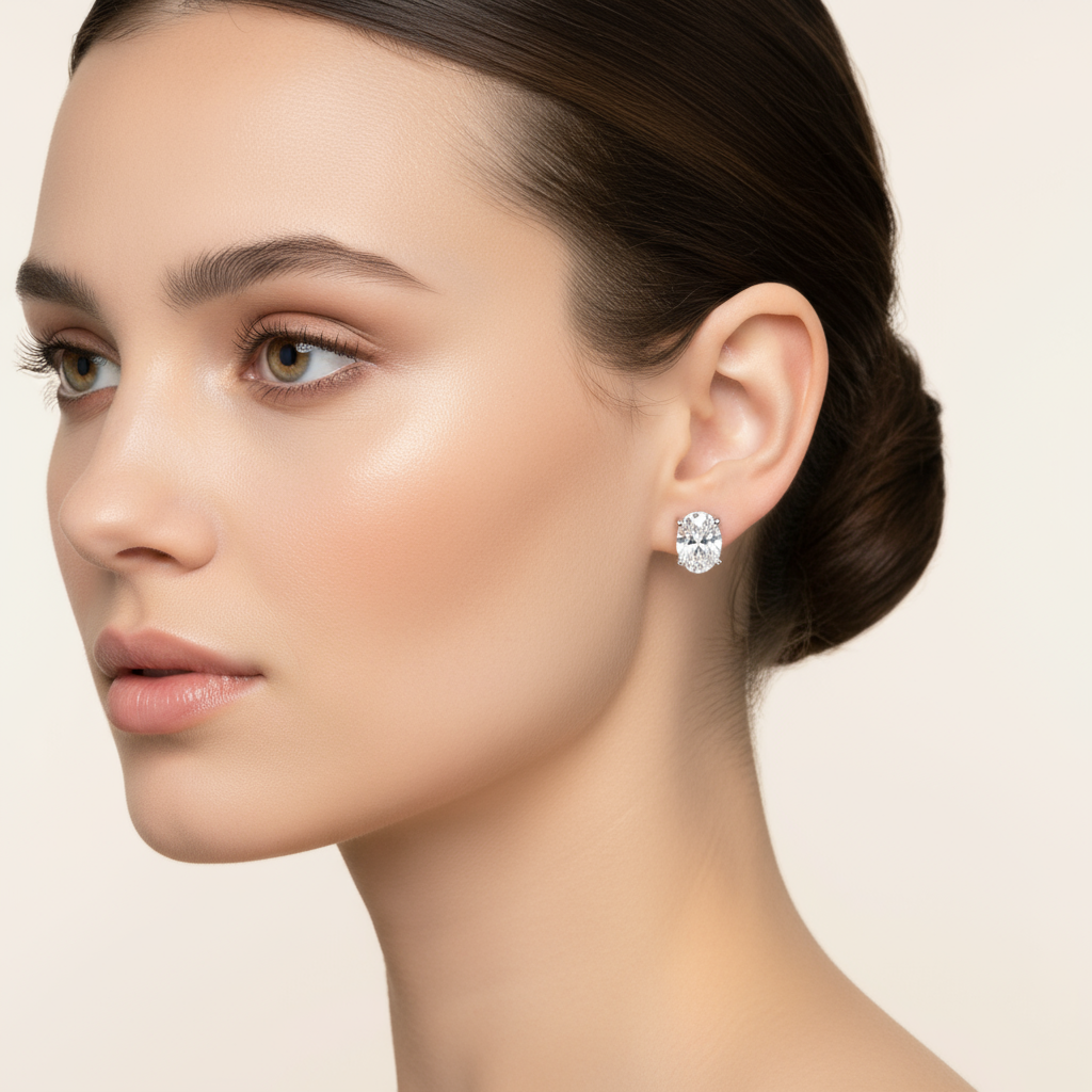 Female model wearing diamond stud earrings