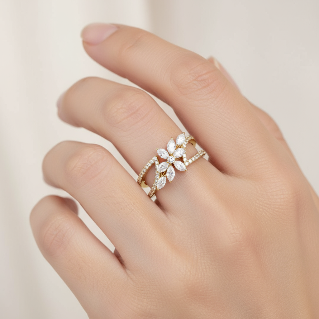 Female model wearing marquise diamond floral cluster ring with split shank