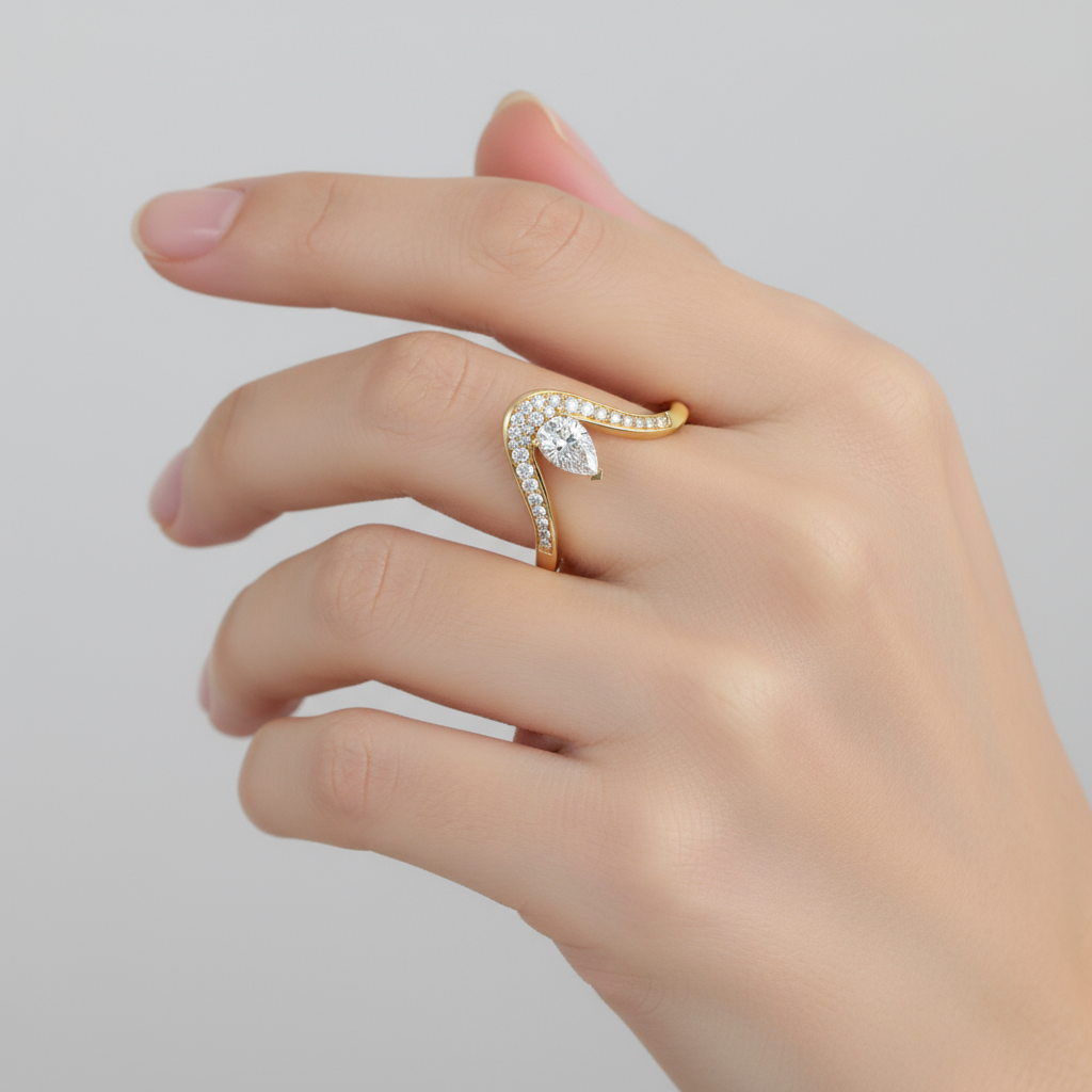 Female model wearing modern asymmetric pear-shaped diamond ring