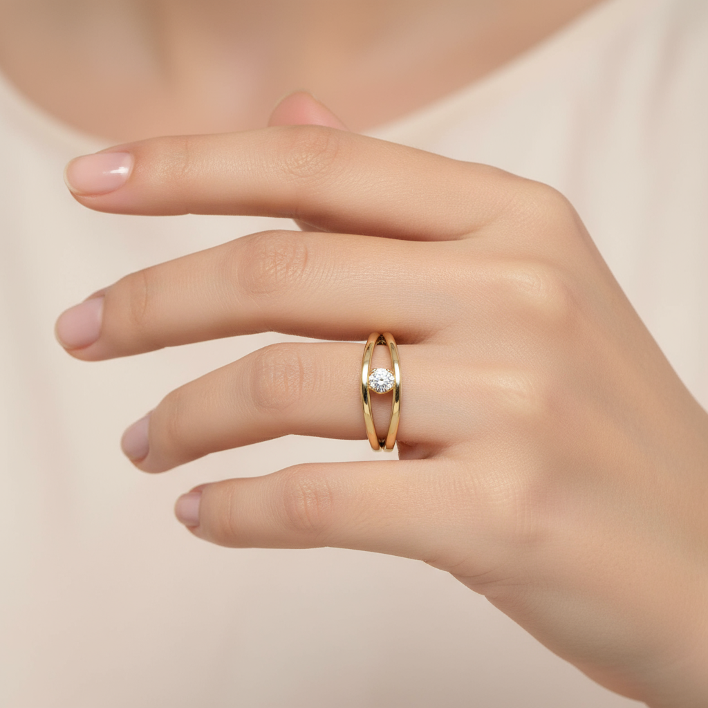Female model wearing split-shank diamond solitaire ring