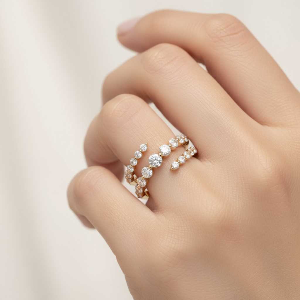 Female model wearing triple-wrap spiral diamond ring