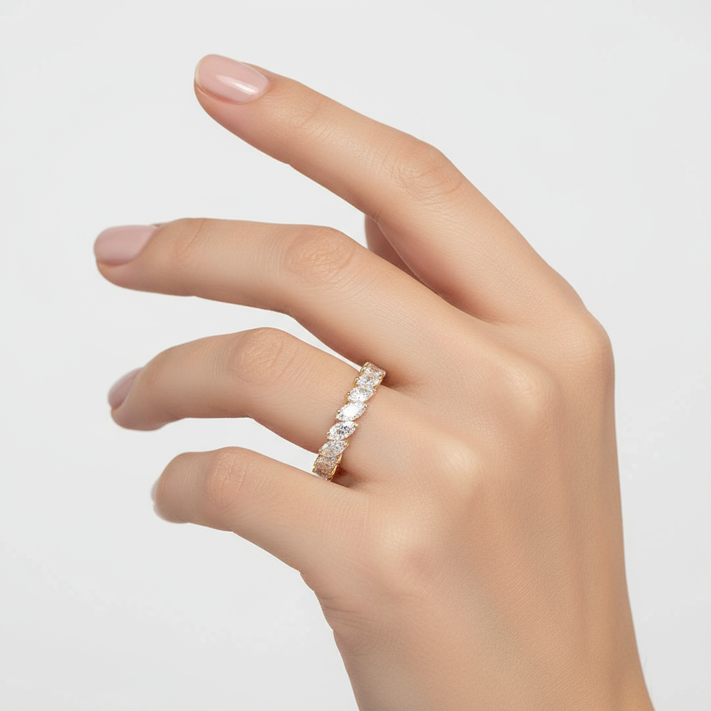 Generated image of a female model wearing small-sized yellow gold and marquise diamond eternity band