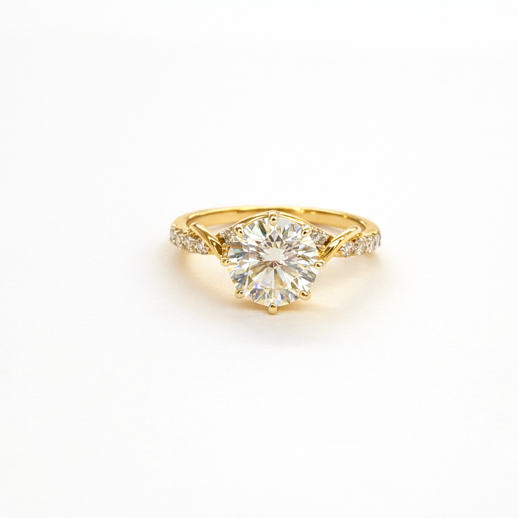 Gold ring with a large diamond on a white background