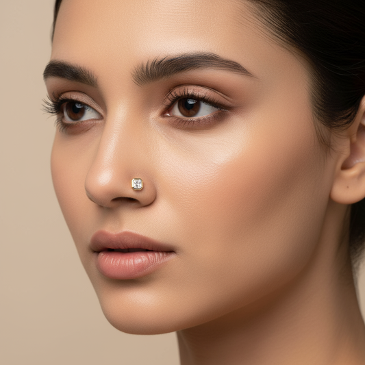 Female model wearing Asscher-cut diamond nose pin with bezel setting