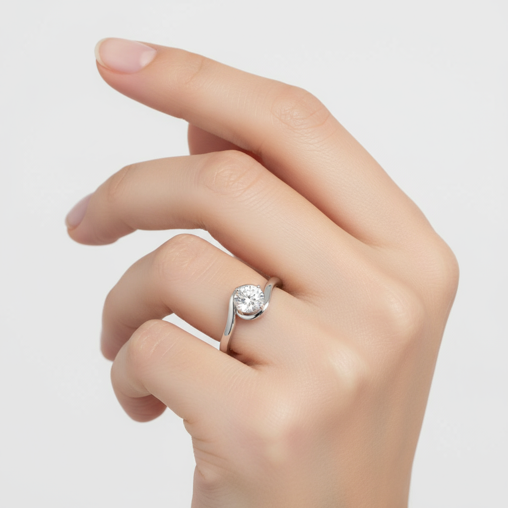 Female model wearing bypass diamond solitaire ring