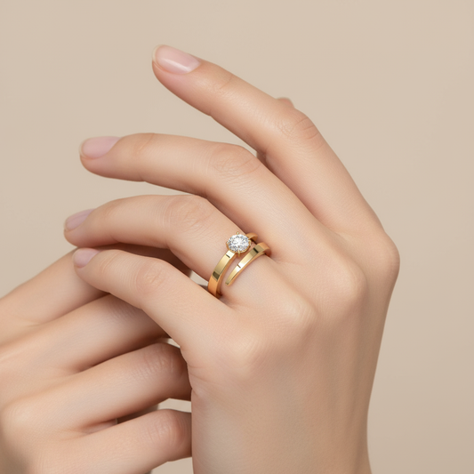 Female model wearing bypass diamond solitaire ring