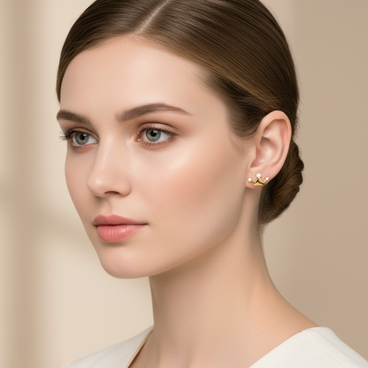 Female model wearing crown diamond earrings
