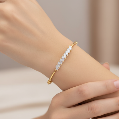 Female model wearing diamond bangle bracelet