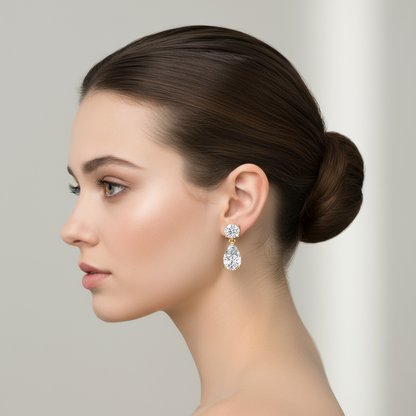 Female model wearing diamond drop earrings