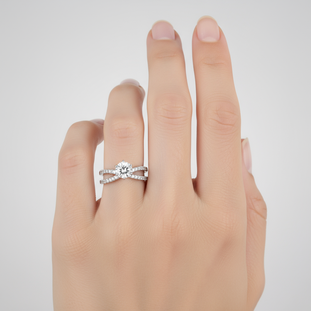 Female model wearing diamond engagement ring with crossover band