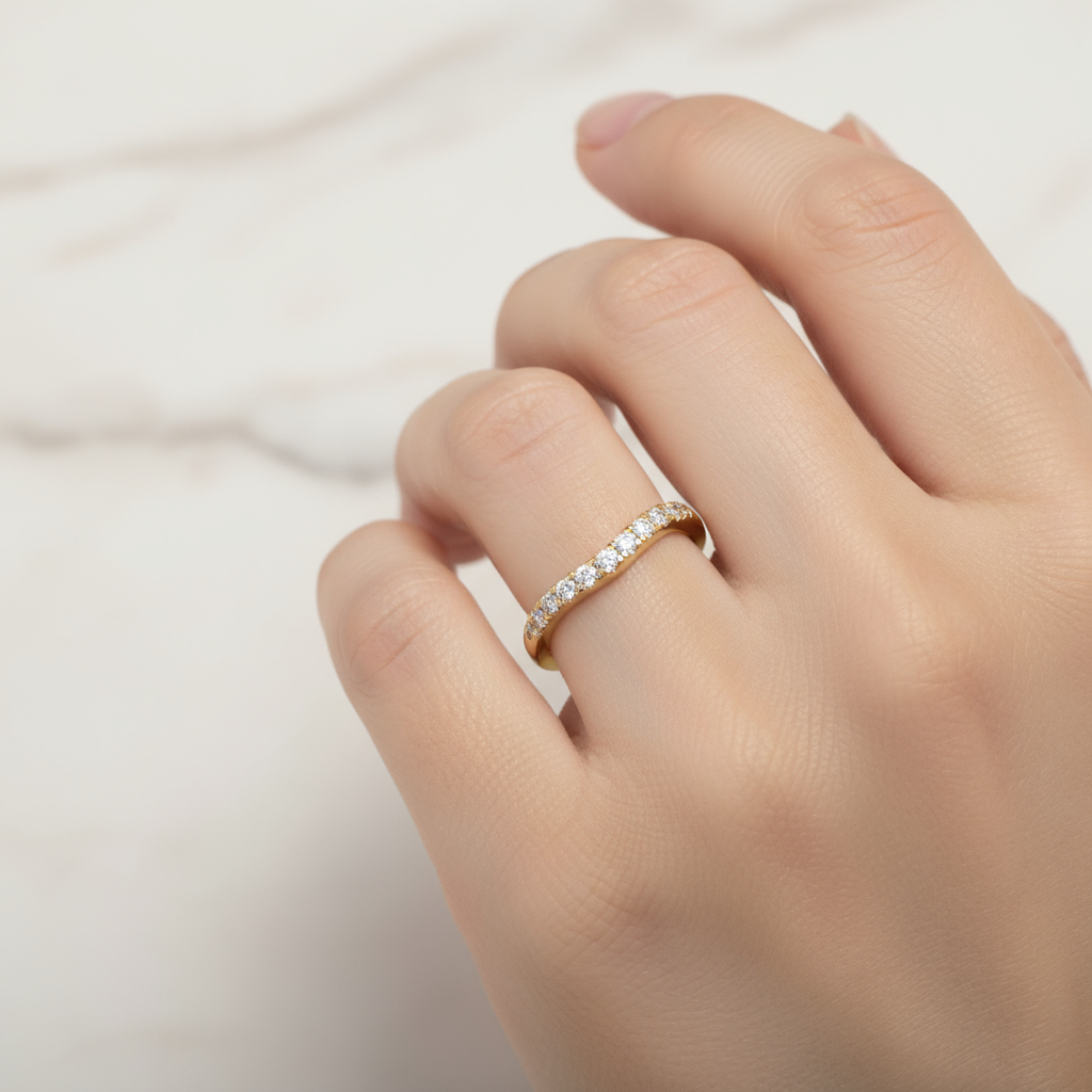 Female model wearing diamond half-eternity band ring