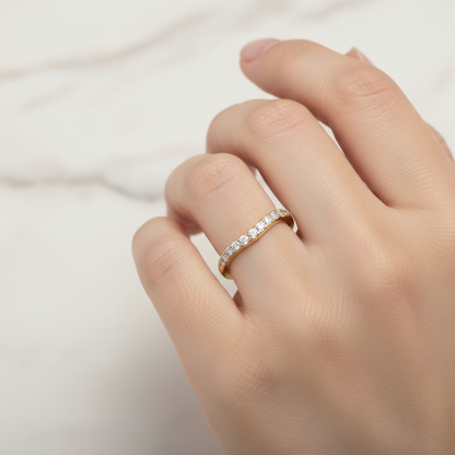 Female model wearing diamond half-eternity band ring