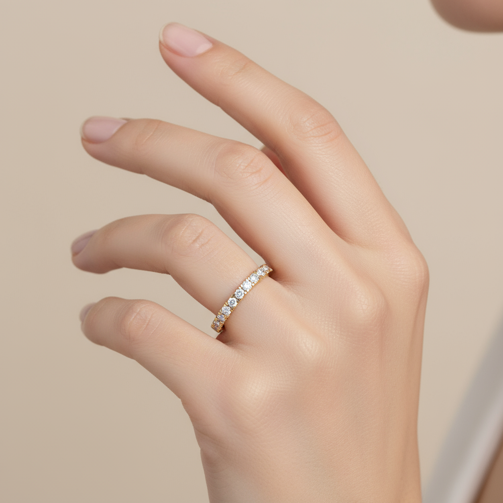 Female model wearing diamond half-eternity band ring