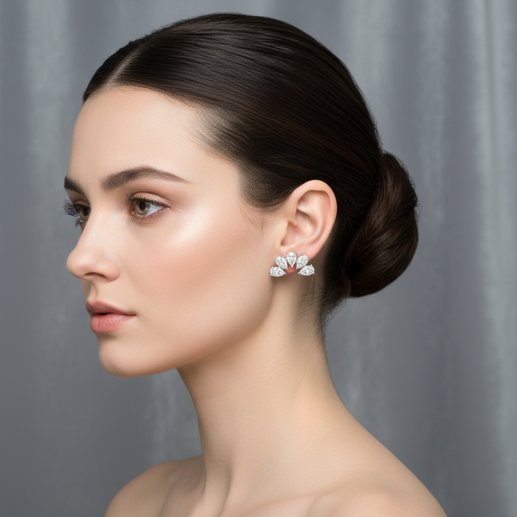 Female model wearing diamond pear-shaped earrings