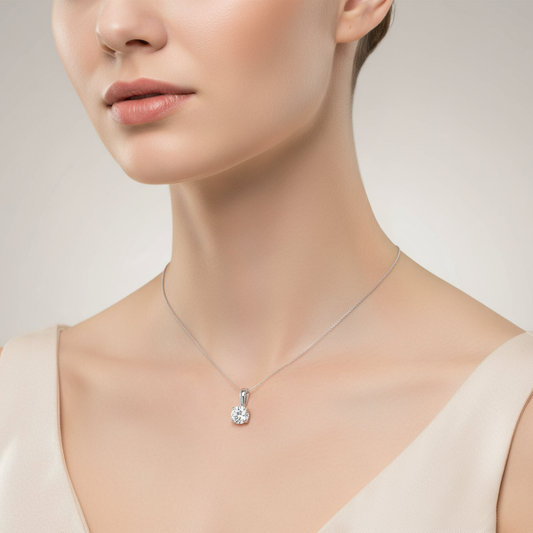 Female model wearing diamond solitaire pendant