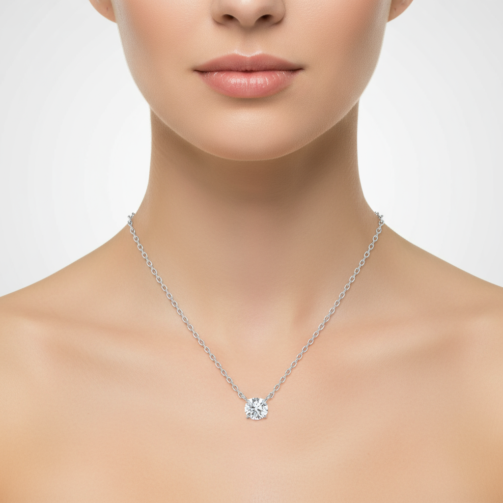 Female model wearing diamond solitaire pendant