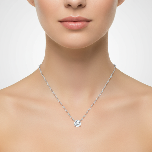 Female model wearing diamond solitaire pendant