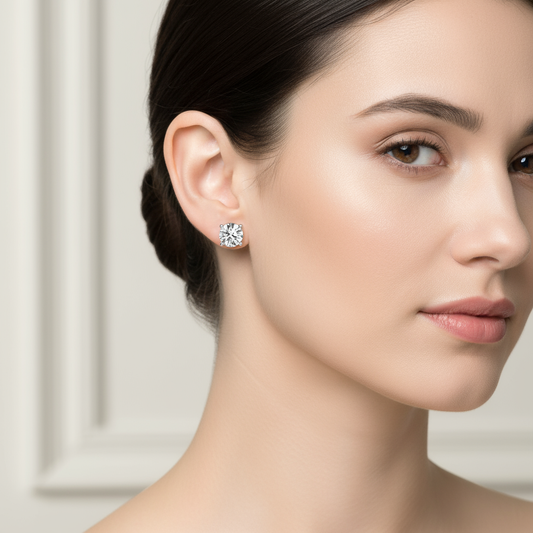 Female model wearing diamond stud earrings