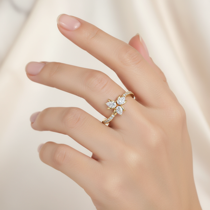 Female model wearing floral diamond cluster ring