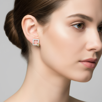 Female model wearing geometric diamond earrings