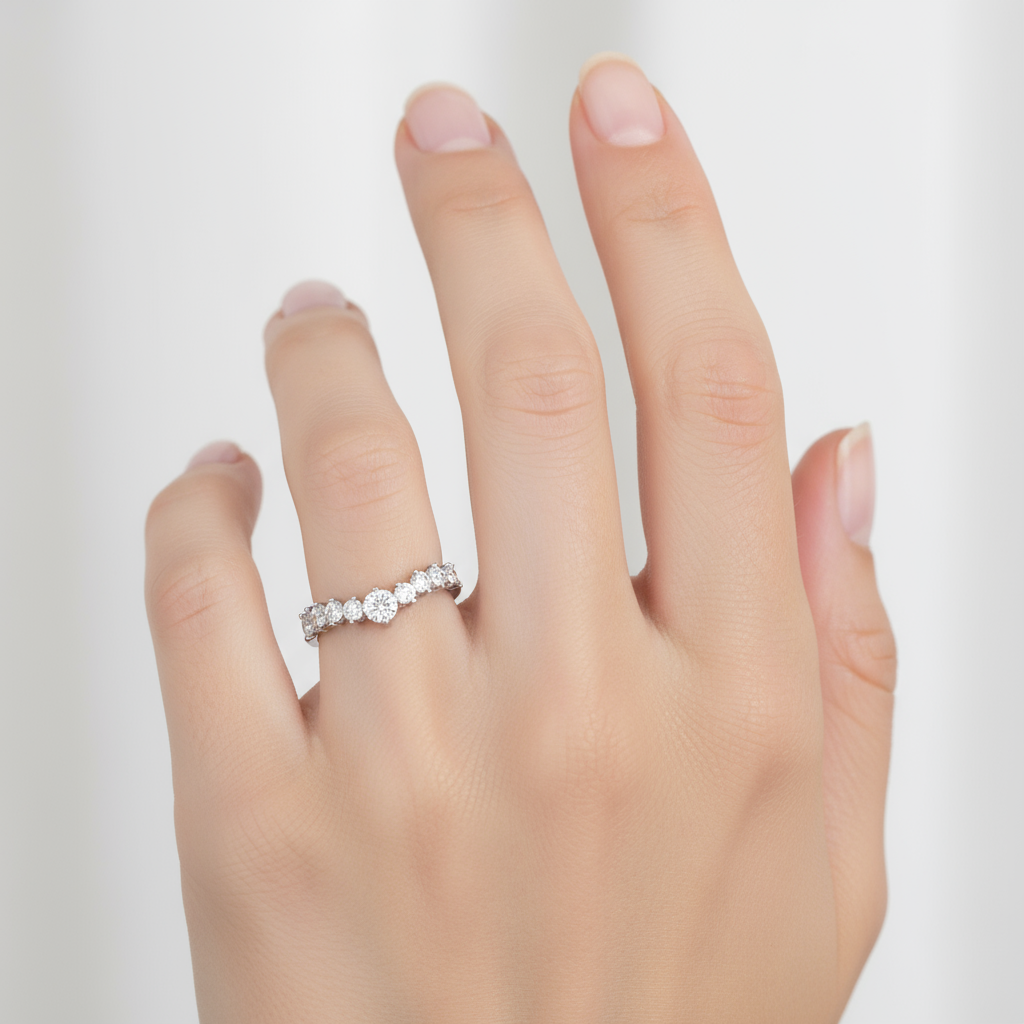 Female model wearing graduated diamond curved band ring