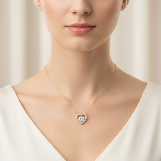 Female model wearing heart-shaped diamond pendant
