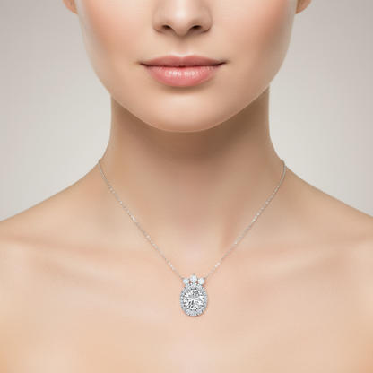Female model wearing oval diamond halo pendant