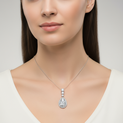 Female model wearing pear-shaped diamond pendant