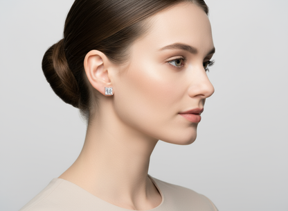 Female model wearing princess-cut diamond stud earrings