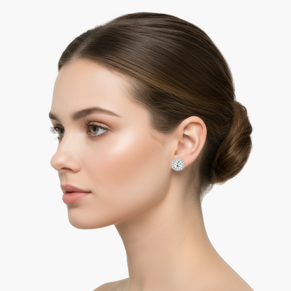 Female model wearing round diamond halo stud earrings