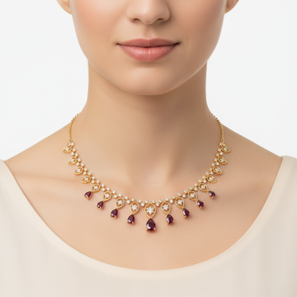 Female model wearing ruby and diamond necklace