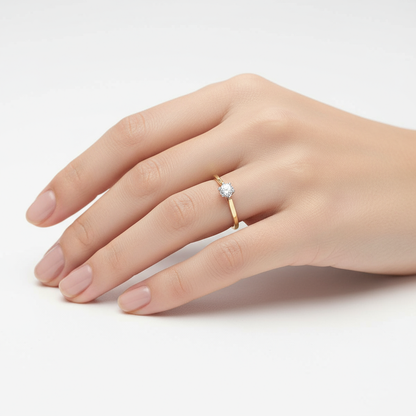 Female model wearing two-tone diamond solitaire ring