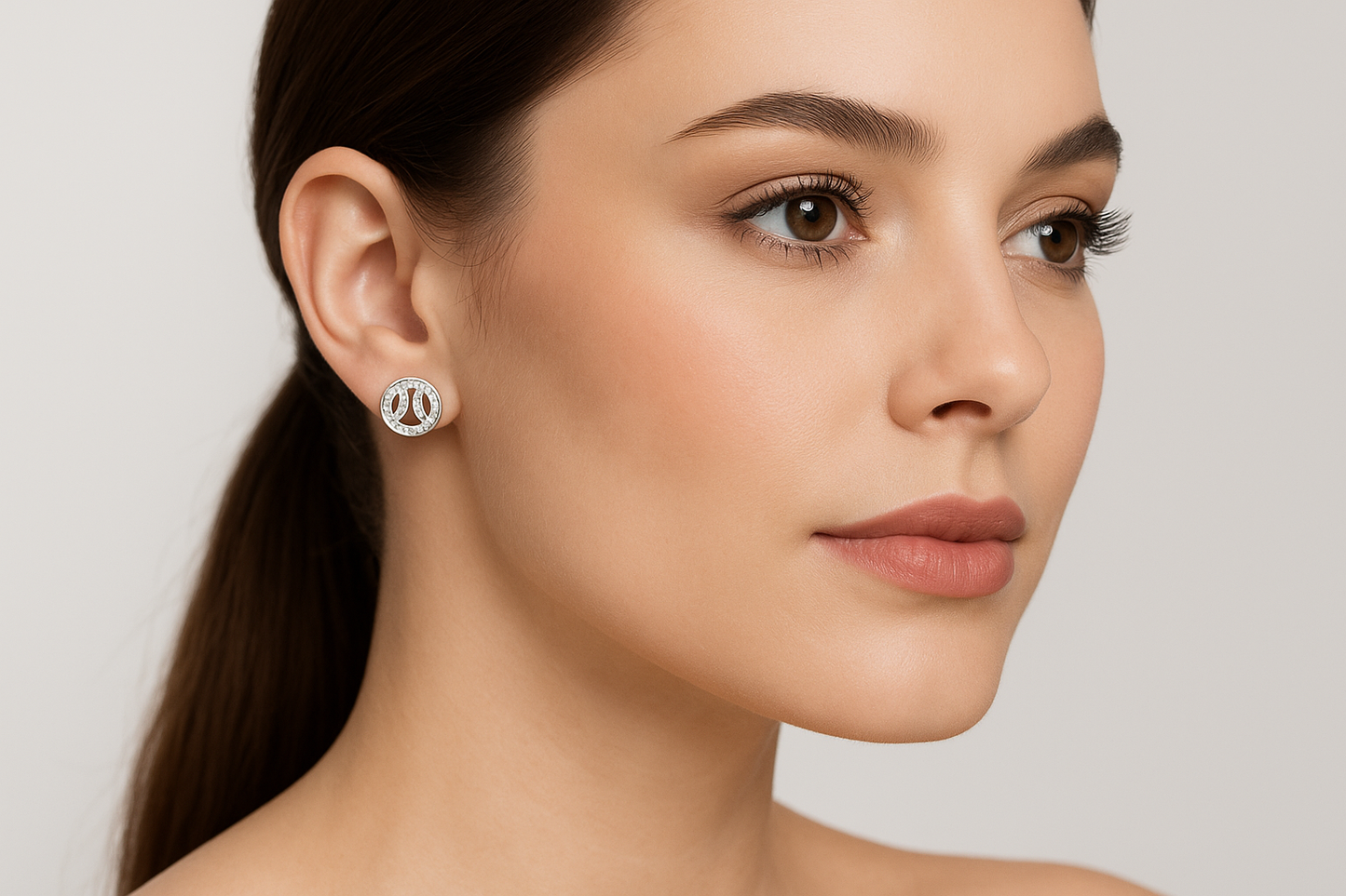 Generated image of a female model wearing small-sized circular diamond earrings