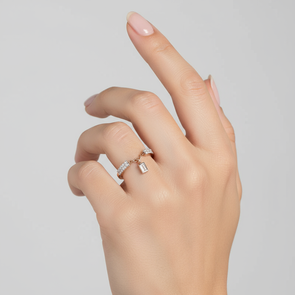 Generated image of a female model wearing small-sized two-tone gold ring with pavé diamonds and chain detail
