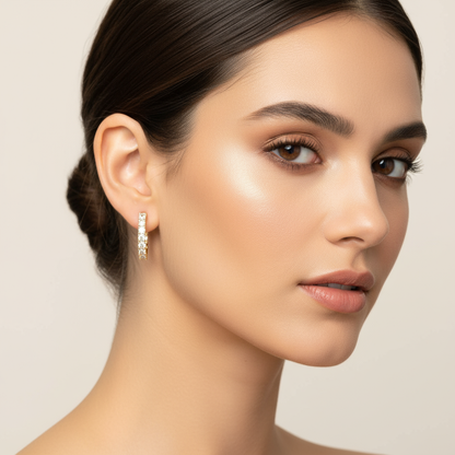 Generated image of a female model wearing small-sized yellow gold and diamond hoop earrings