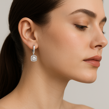 Generated image of a female model wearing the diamond halo drop earrings in small size