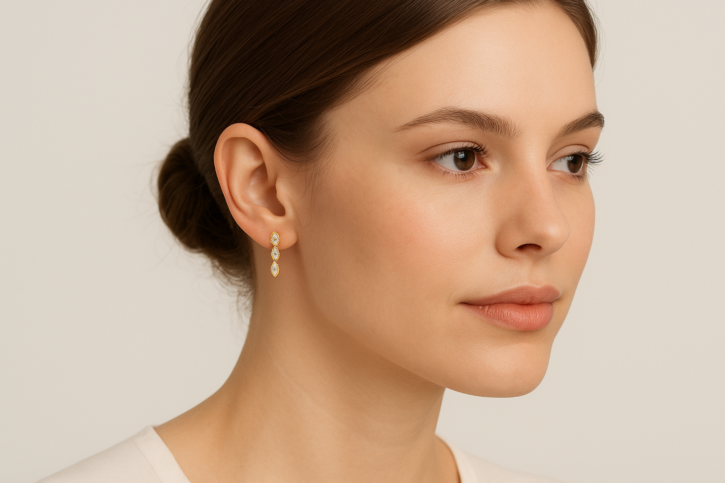 Generated image of a female model wearing the gold and diamond drop earrings in a smaller size