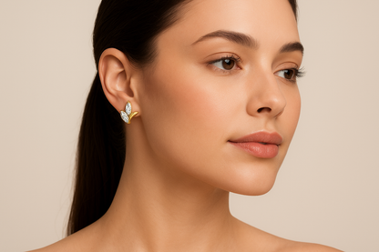 Generated image of a female model wearing the gold and diamond leaf earrings