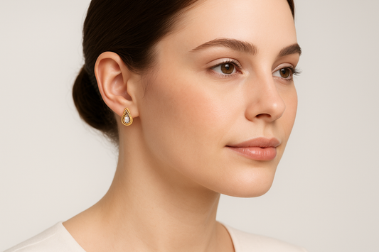 Generated image of a female model wearing the gold and diamond teardrop earrings in a smaller size