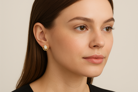 Generated image of a female model wearing the gold and diamond teardrop earrings in a smaller size