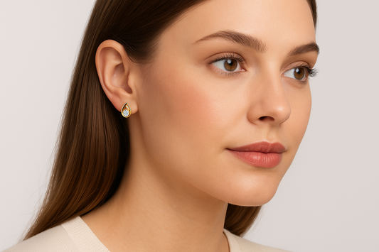 Generated image of a female model wearing the gold and diamond teardrop earrings in a smaller size